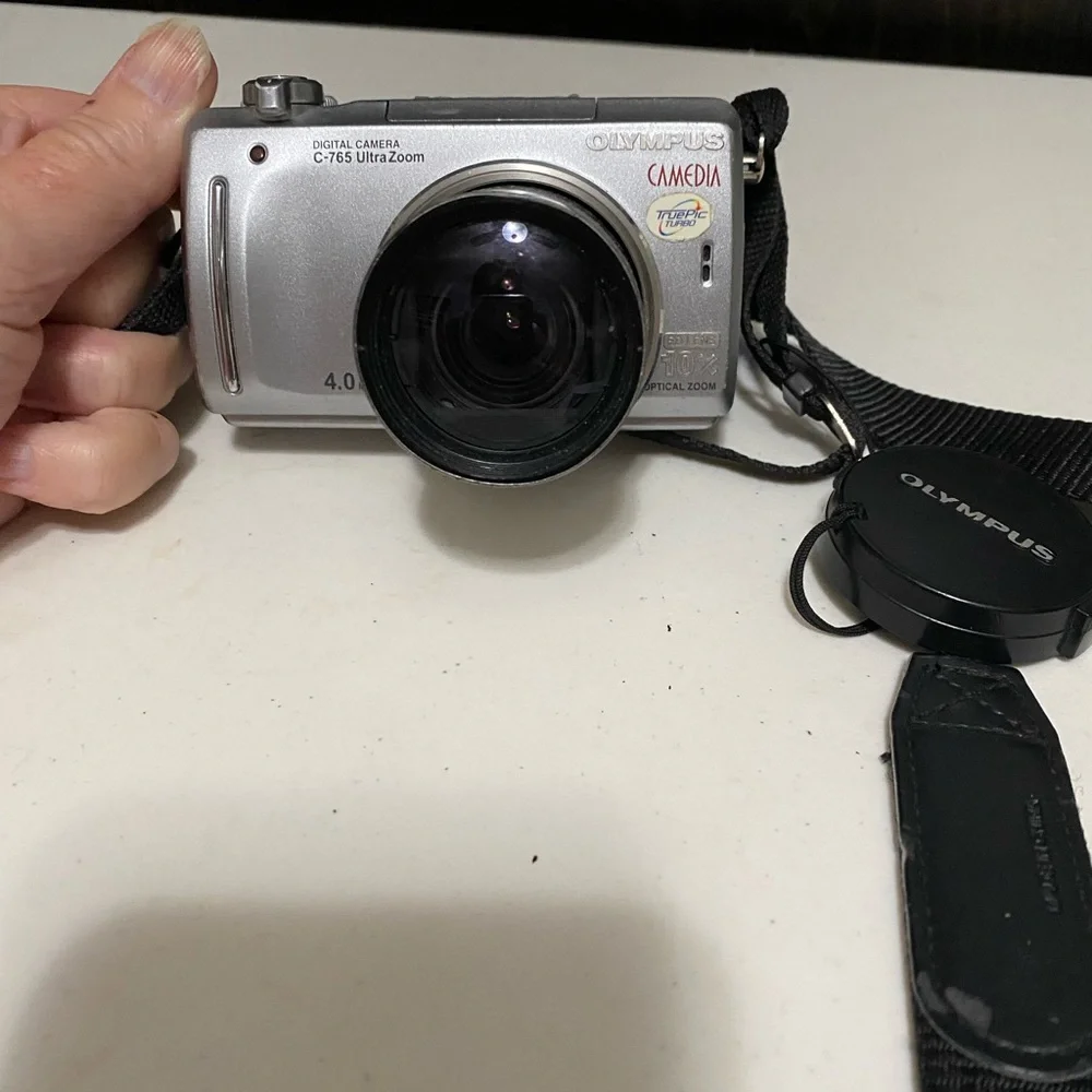 Olympus Silver Digital Camera with Charger